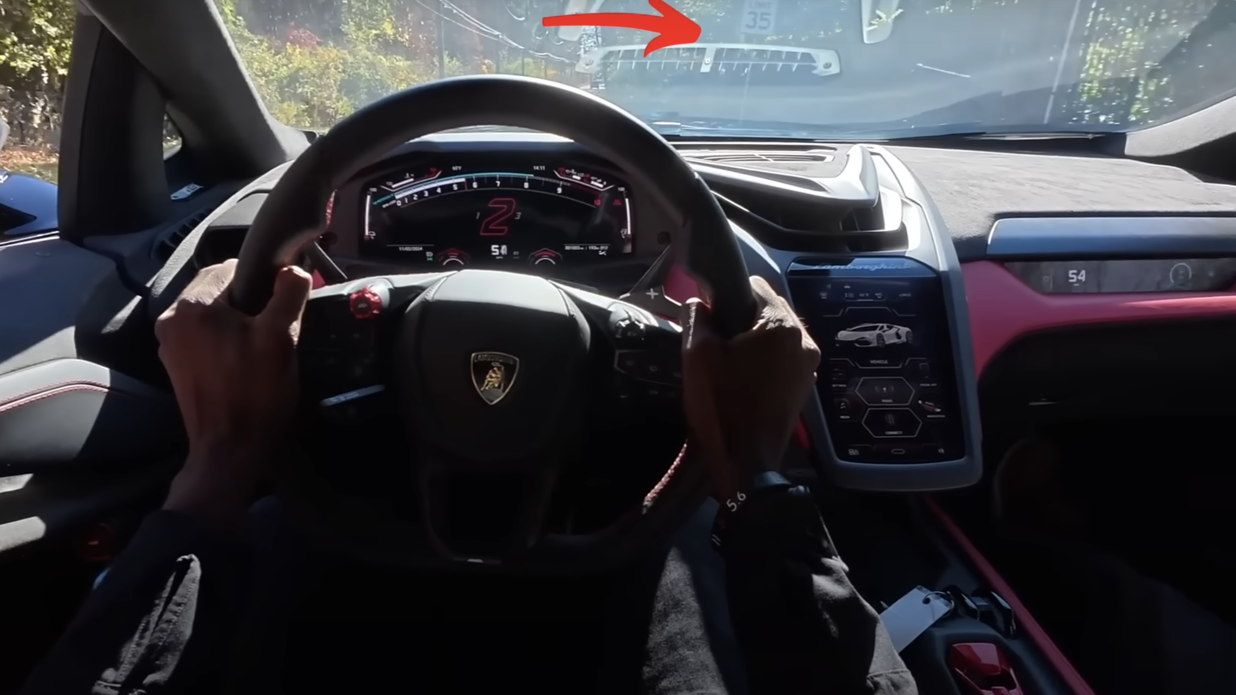 Video showing Marquess Brownlee exceeding the speed limit with a 35mph sign visible
